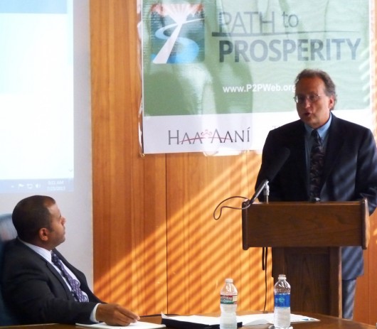 Haa Aani CEO Russell Dick, left, listens as The Nature Conservancy Southeast Director Norman Cohen talks about the Path to Prosperity competition.