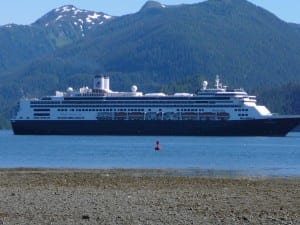 A cruise ship anchors near downtown Sitka. Passengers take small lightering boats to local docks. IEd Schoenfeld/CoastAlaska News)