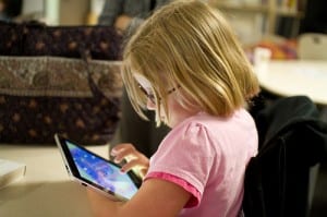 The Sitka School District envisions tablets for students in the elementary grades, and laptops for older students. (Flickr photo/Devon Christopher Adams}