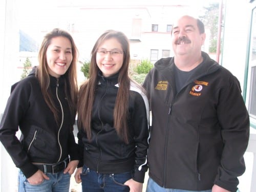 Renatta Olson, Joallyn Johnson, and Mt. Edgecumbe girls basketball coach Dane Vincent. (KCAW photo/Robert Woolsey)