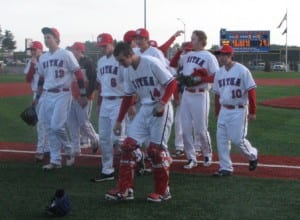 The Sitka Wolves baseball team comes off the field after clinching the Region V title. (KCAW photo/Robert Woolsey)