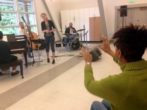 Dee Daniels (r.) works with Juliana Loughin on the phrasing in her song "The Glove." Daniels says there's a process of "breakdown and breakthrough" that enriches singers lives outside of music. (KCAW photo/Robert Woolsey)