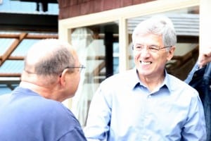 Democratic gubernatorial candidate Byron Mallott greets supporter Eric Jordan in Sitka on primary day, August 19, 2014. (KCAW photo/Rachel Waldholz)