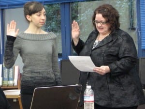 Senior Kaya Duguay replaces JD Murphy as the Sitka School Board's student member. Duguay demonstrated early acumen for the job. (KCAW photo/Robert Woolsey)
