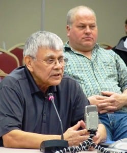 Subsistence Regional Advisory Council Chairman Bert Adams presents recommendations as seiner Bob Thorstenson listens. Ed Schoenfeld photo.