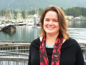 Analyst Meilani Schijvens stands by Sitka's Crescent Harbor and lightering dock. She told the Southeast Conference fishing and tourism are growing in the region. CoastAlaska News photo)