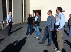 Interim Municipal Administrator Jay Sweeney updates employees after they evacuated City Hall when fire alarms sounded Friday afternoon. A drop in water pressure in the sprinkler system caused the alarms to sound. People were allowed back inside shortly after 4 p.m. (KCAW photo by Ed Ronco)