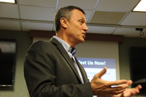 Bob Whicker presents Alaska 1:1 Initiative at Chamber of Commerce meeting. (photo by KCAW's Emily Forman)