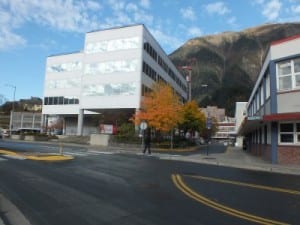 Sealaska Plaza, left, in Juneau is home to the regional Native corporation’s headquarters. Winter dividends will be sent out or deposited starting Dec. 6. (Casey Kelly/KTOO)