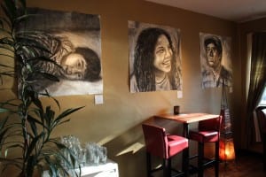The artist based her portraits on what people told her about keeping secrets. (KCAW photo/Rachel Waldholz)