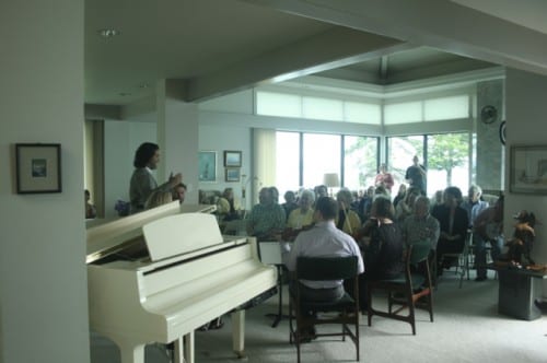 Sitka Summer Music Festival artistic director Zuill Bailey explains some musical backstories at Sunday's final concert. (KCAW photo/Greta Mart)