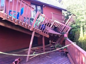 The collapsed deck on Halibut Pt. Road. Building official William Stortz confirms that it was a failure of wood rather than hardware. (KCAW photo)