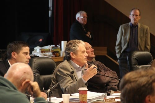 ADF&G Commissioner Sam Cotten speaks, while other council members, including Bill Tweit of Washington (right) look on. (Rachel Waldholz/KCAW)