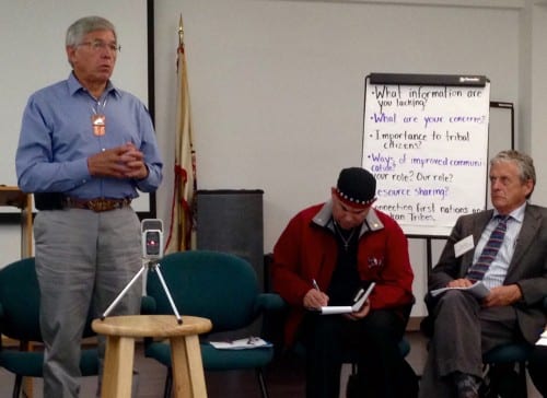 Lt. Gov. Byron Mallott speaks at a Wednesday tribal meeting in Juneau on transboundary mines. United Tribal Transboundary Mining Work Group Co-Chair Rob Sanderson Jr., center, and Fish and Game Commissioner Sam Cotten, right, listen. (Photo by Ed Schoenfeld/CoastAlaska News)