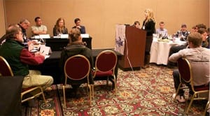 Participants in the 2015 summit practice testifying at a "mock Board of Fisheries" training session.