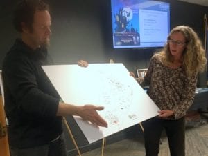 Dave Neutzel (l.) and Bridget Hitchcock explain the playground's innovative design. (KCAW photo/Robert Woolsey)