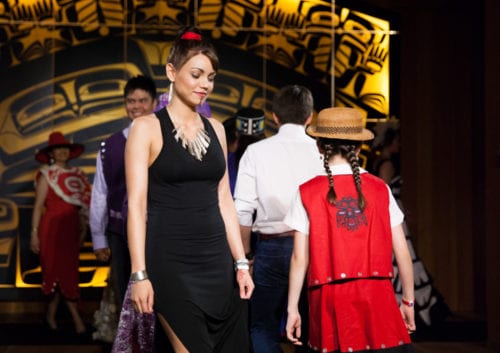 During Celebration this June, Sealaska Heritage Institute sponsored a fashion show, featuring the work of 18 designers. Here, Camille Mauch models jewelry by Rico Worl. (Annie Bartholomew/KTOO photo)