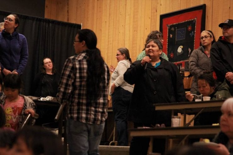 Tribal Council member Martha Moses addressed the crowd as they dined on a herring dinner provided by Sitka Tribe of Alaska (KCAW photo/Enrique Pérez de la Rosa)